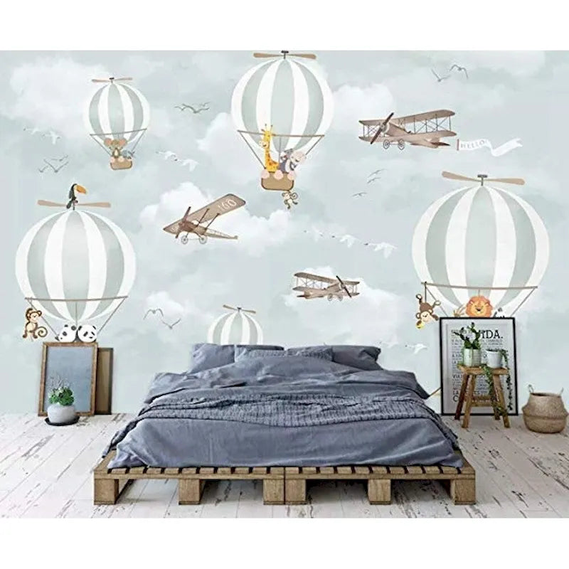 Animales en globos aerostáticos y papel pintado de aviones